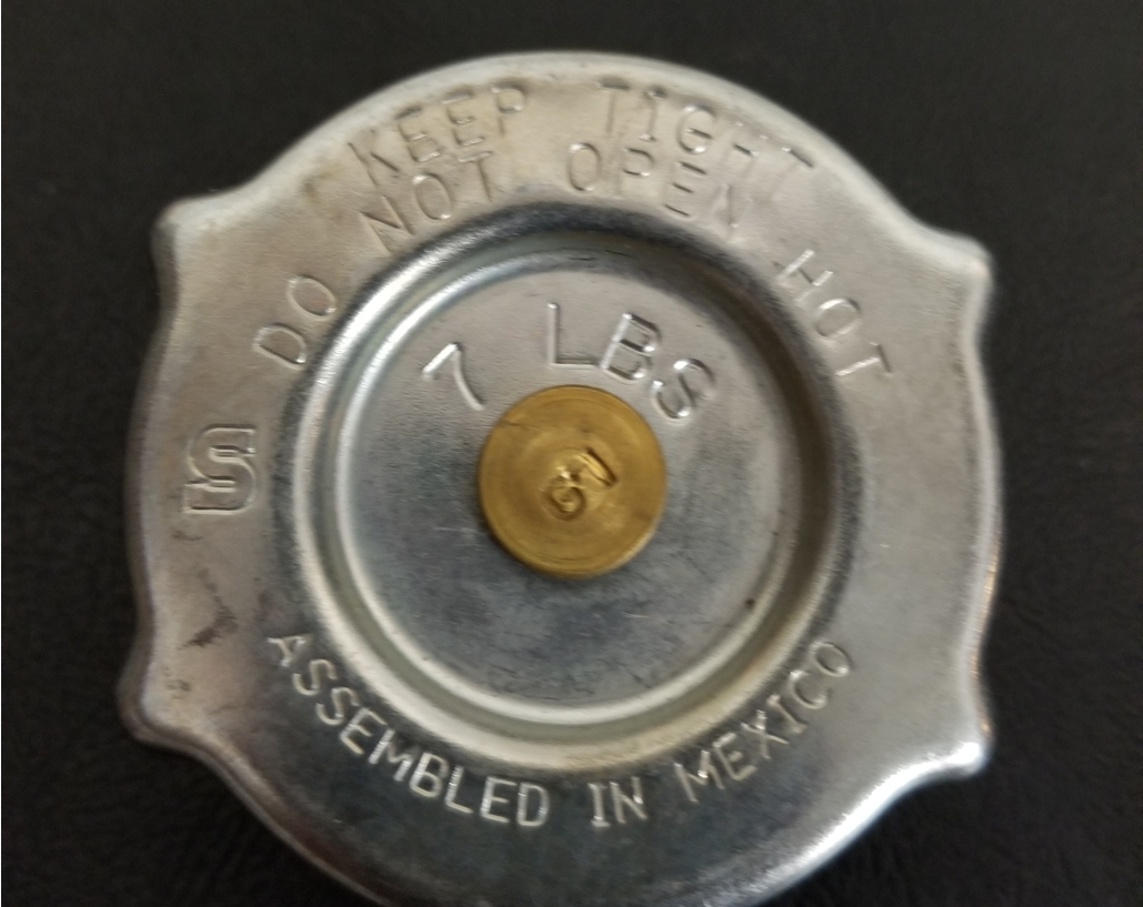 pressure relief radiator cap